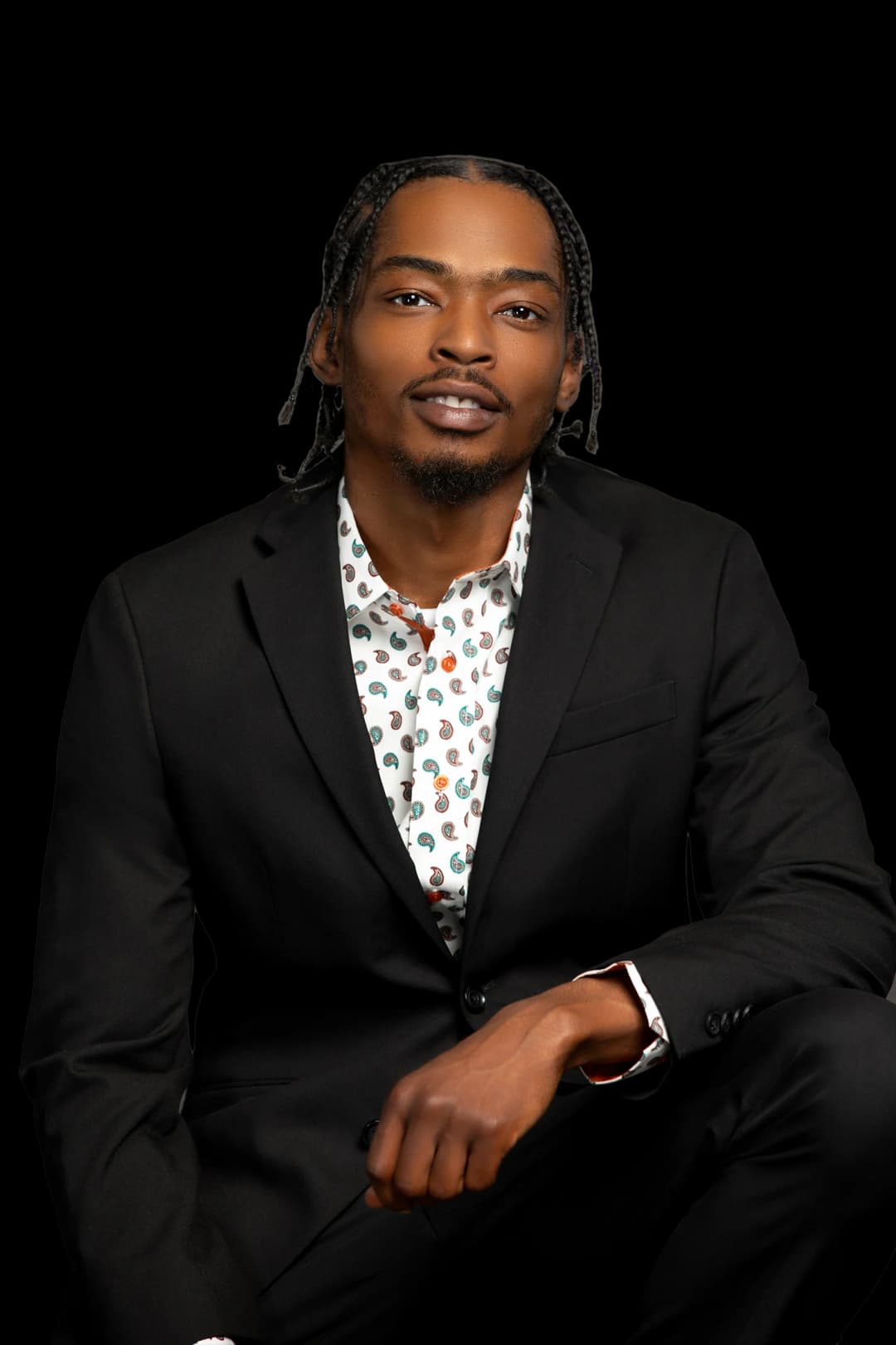 picture of maliek in a suit